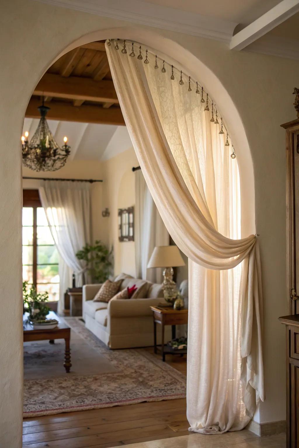 Drapes elegantly define and enhance arched entrances.