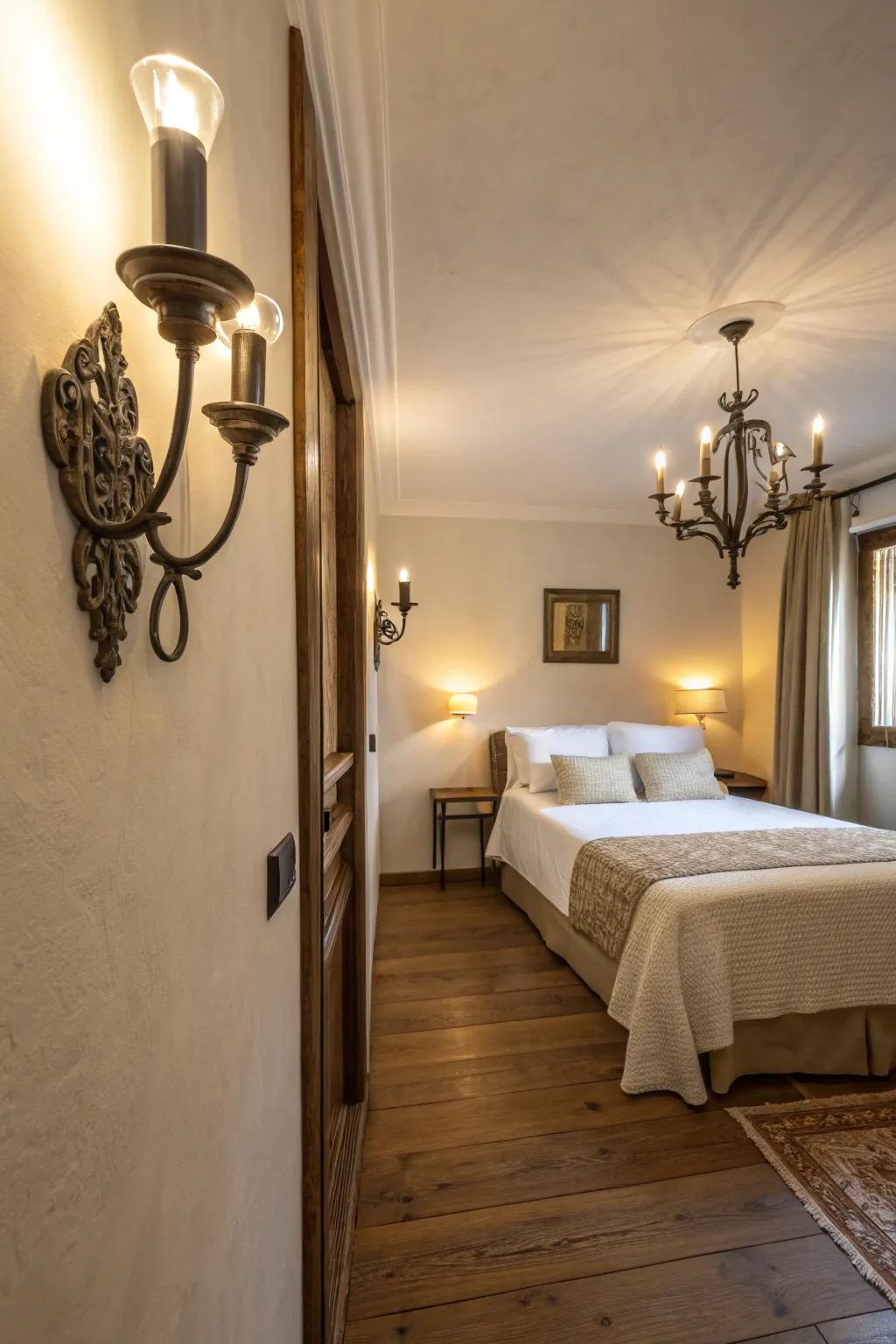 Wall sconces improve lighting while saving floor space in a slender bedroom.