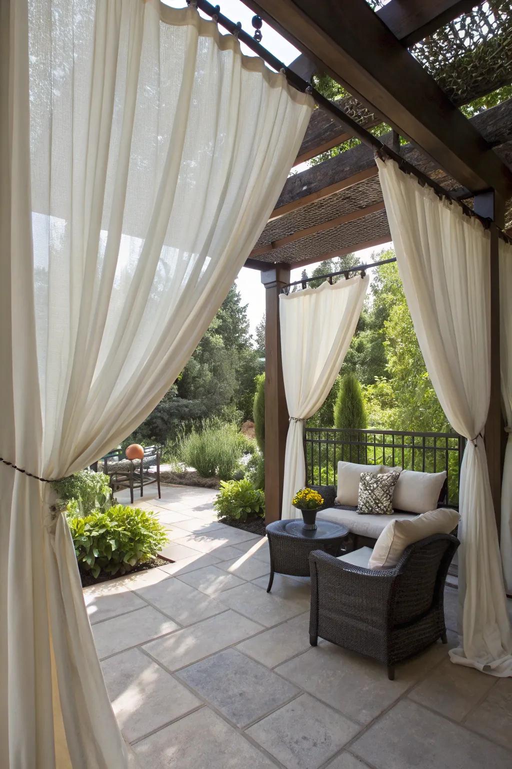 Outdoor curtains offer adjustable shade and a breezy ambiance.