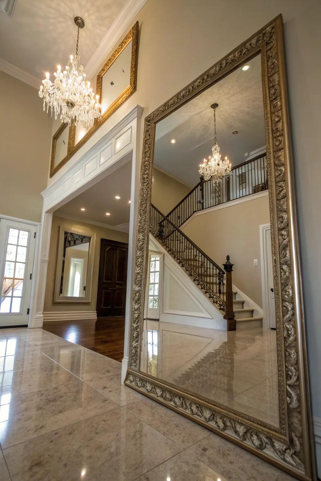 A large mirror increases depth and spreads light across the foyer.