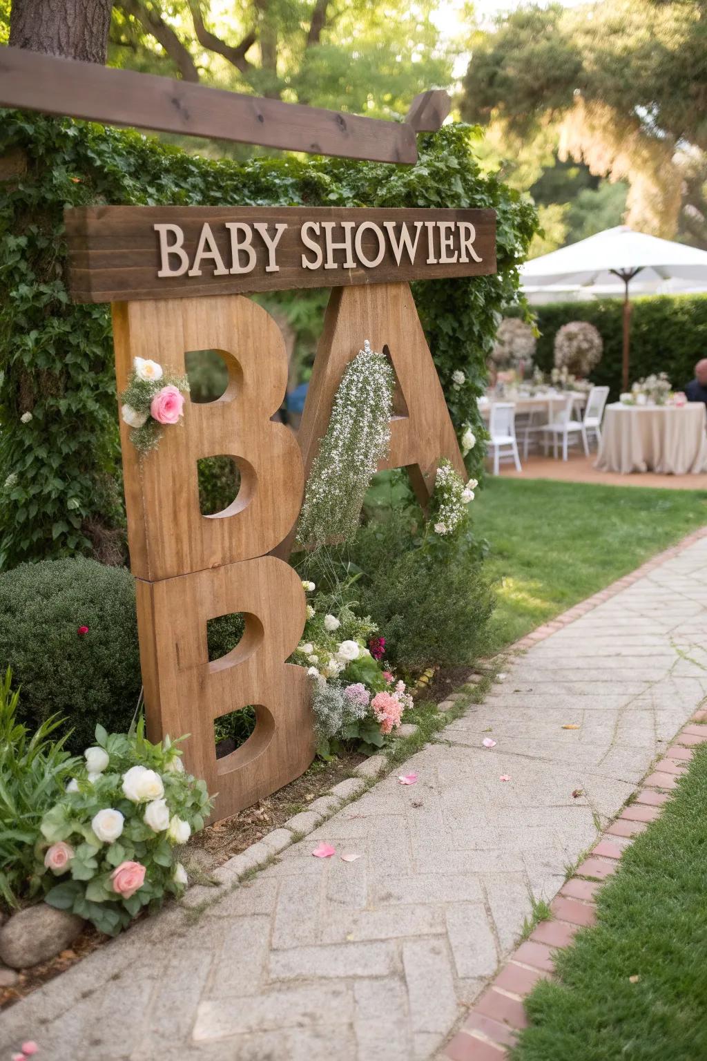 Bespoke monograms enhance the baby shower entrance with sophistication.