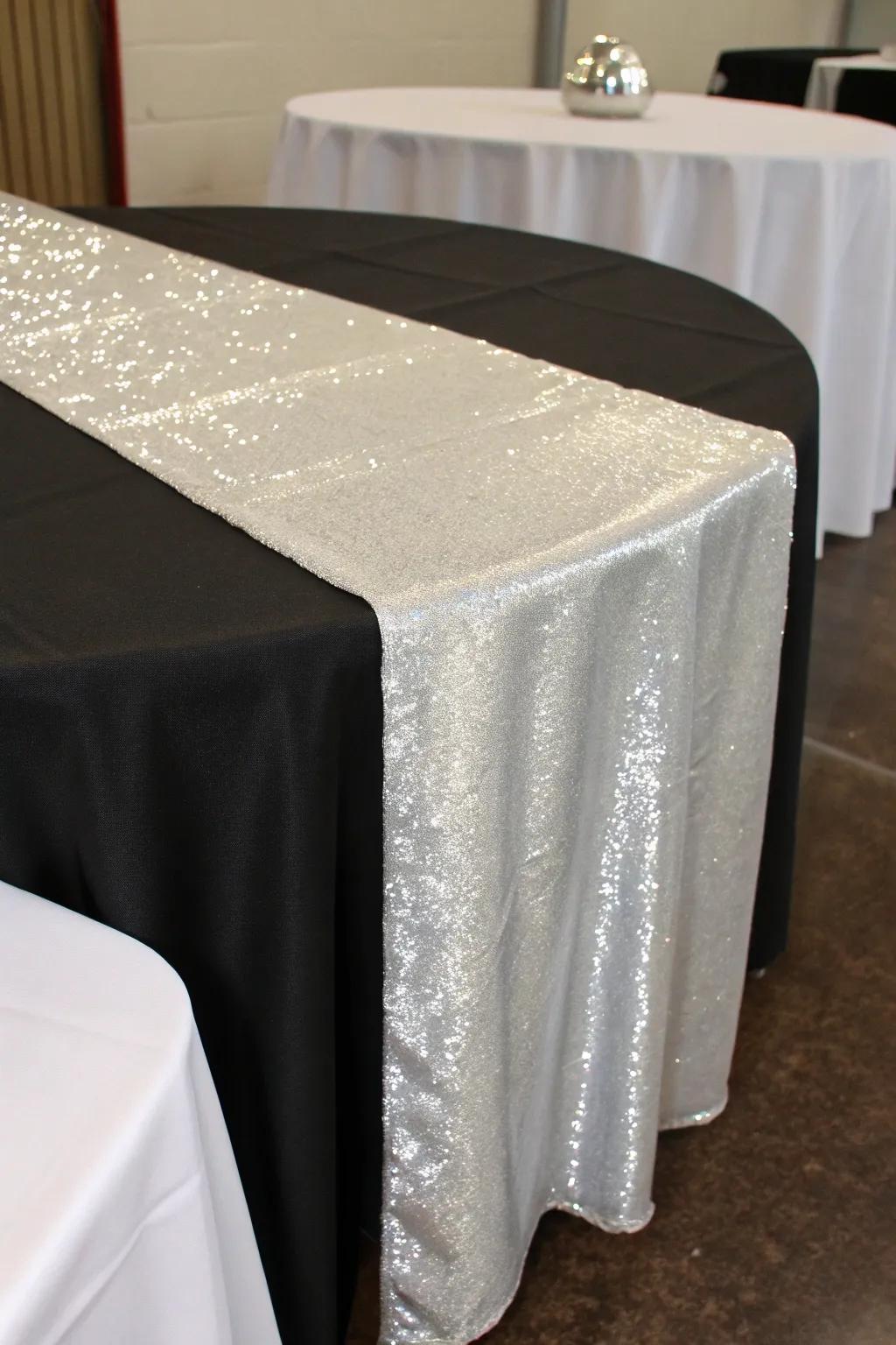 A shimmering table overlay adds grace and depth.
