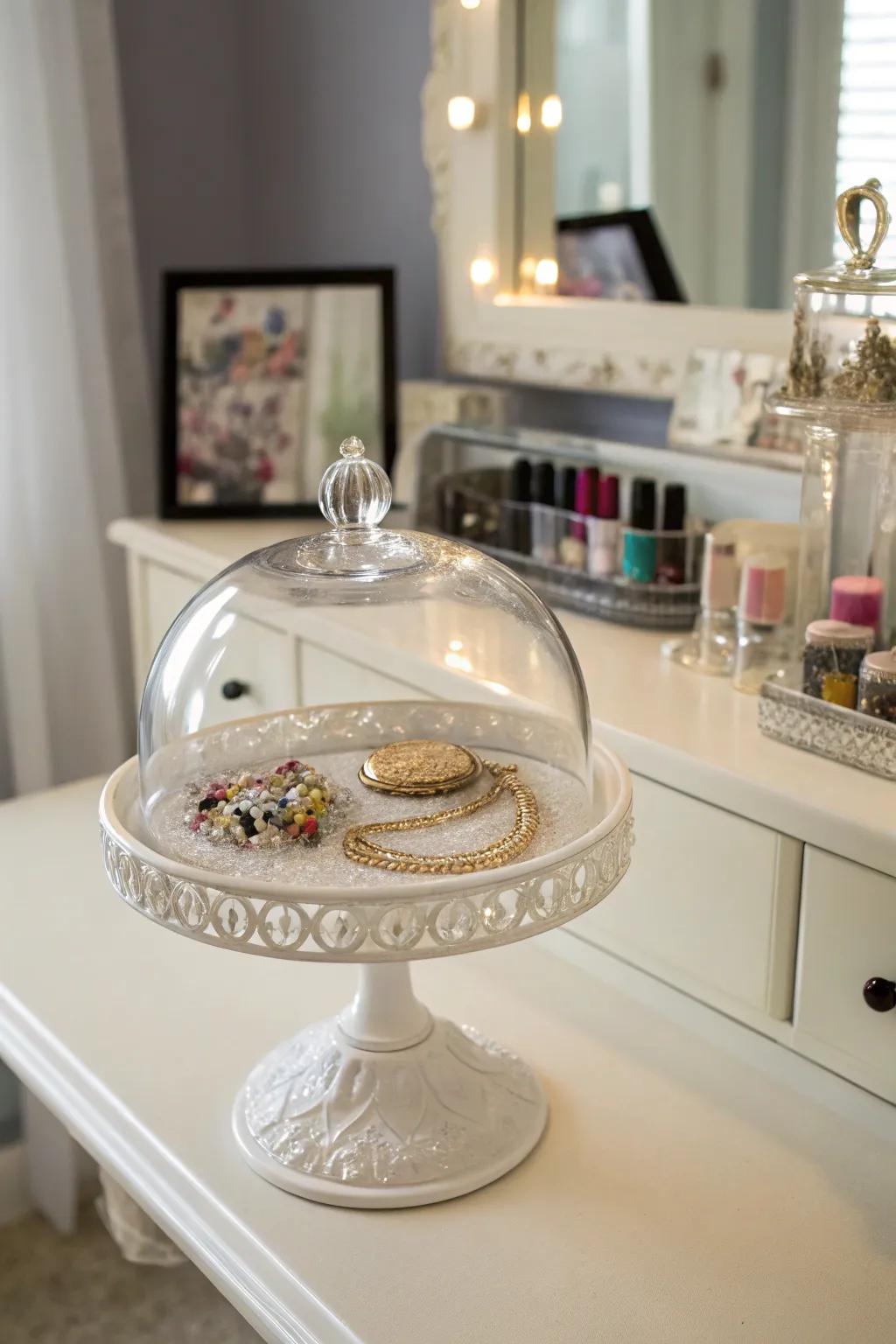 Arrange your jewelry pieces with sophistication beneath a glass dome.