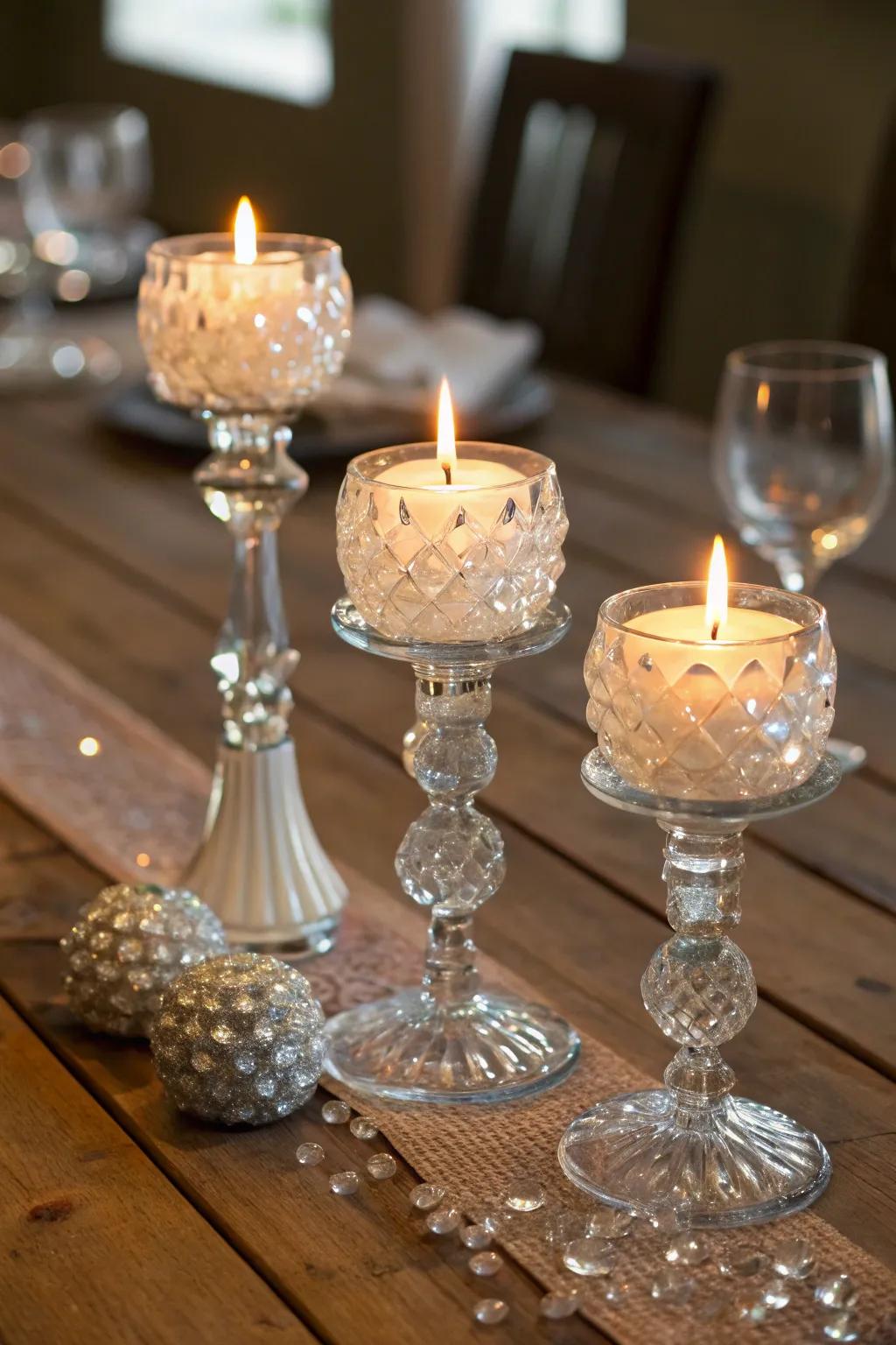 Crystal and glass candle holders elegantly reflecting the light from the candles.