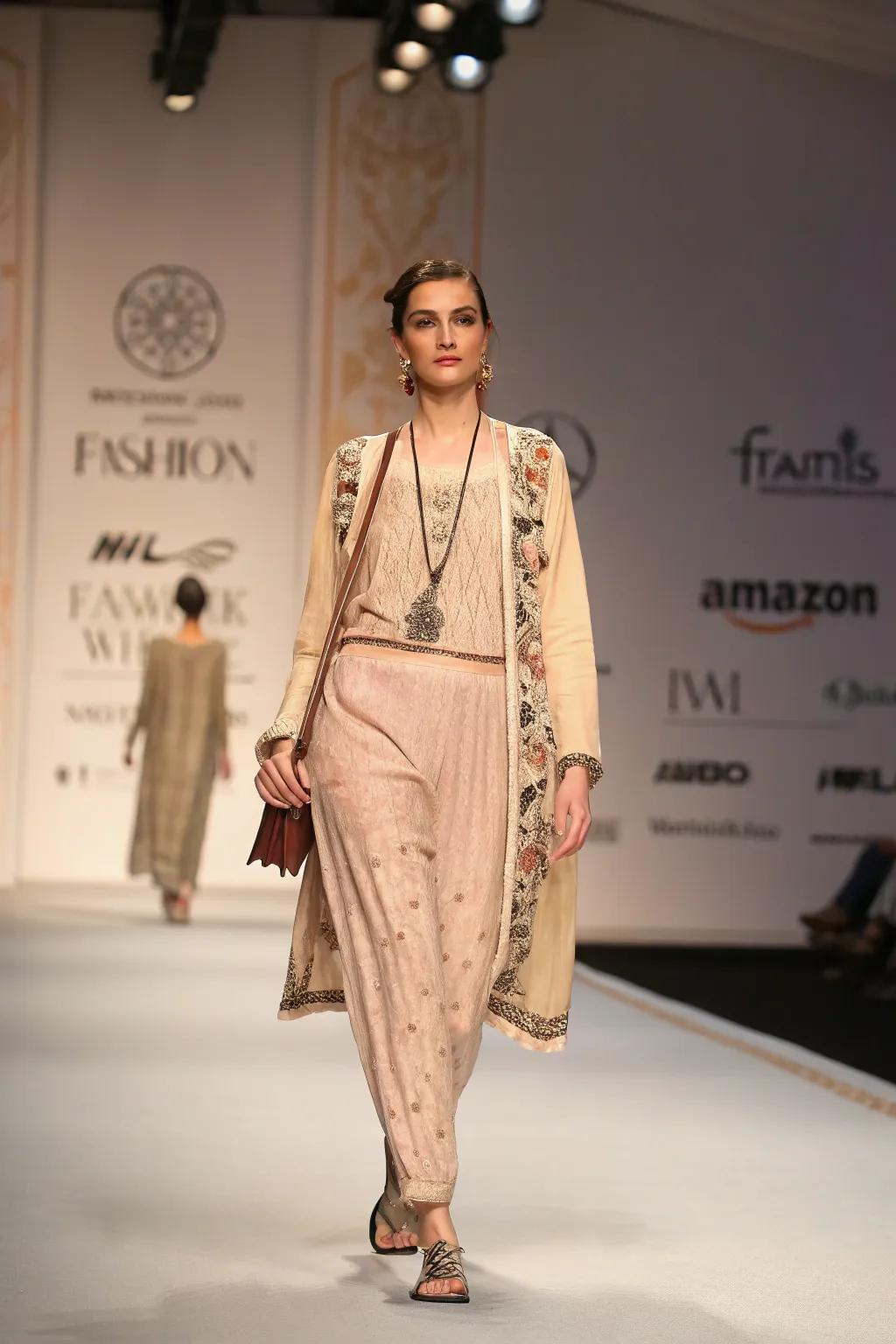 Subtle brand identity components enhance the runway's visual storytelling.