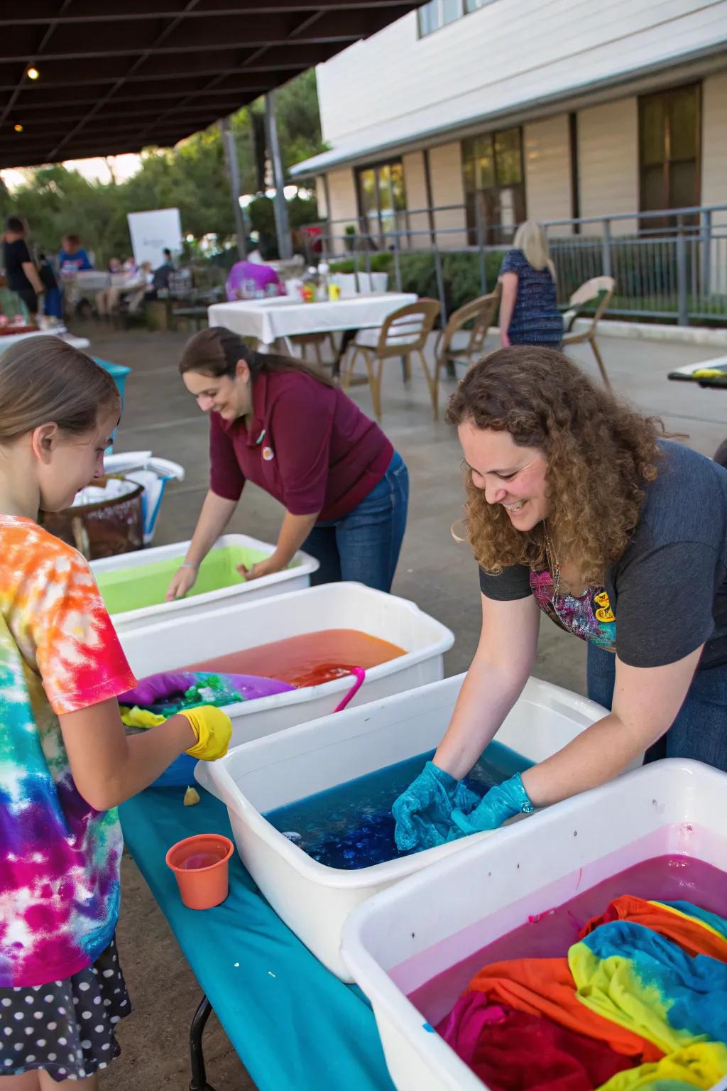 Visitors at the blended dye space creating distinct spectrum designs.