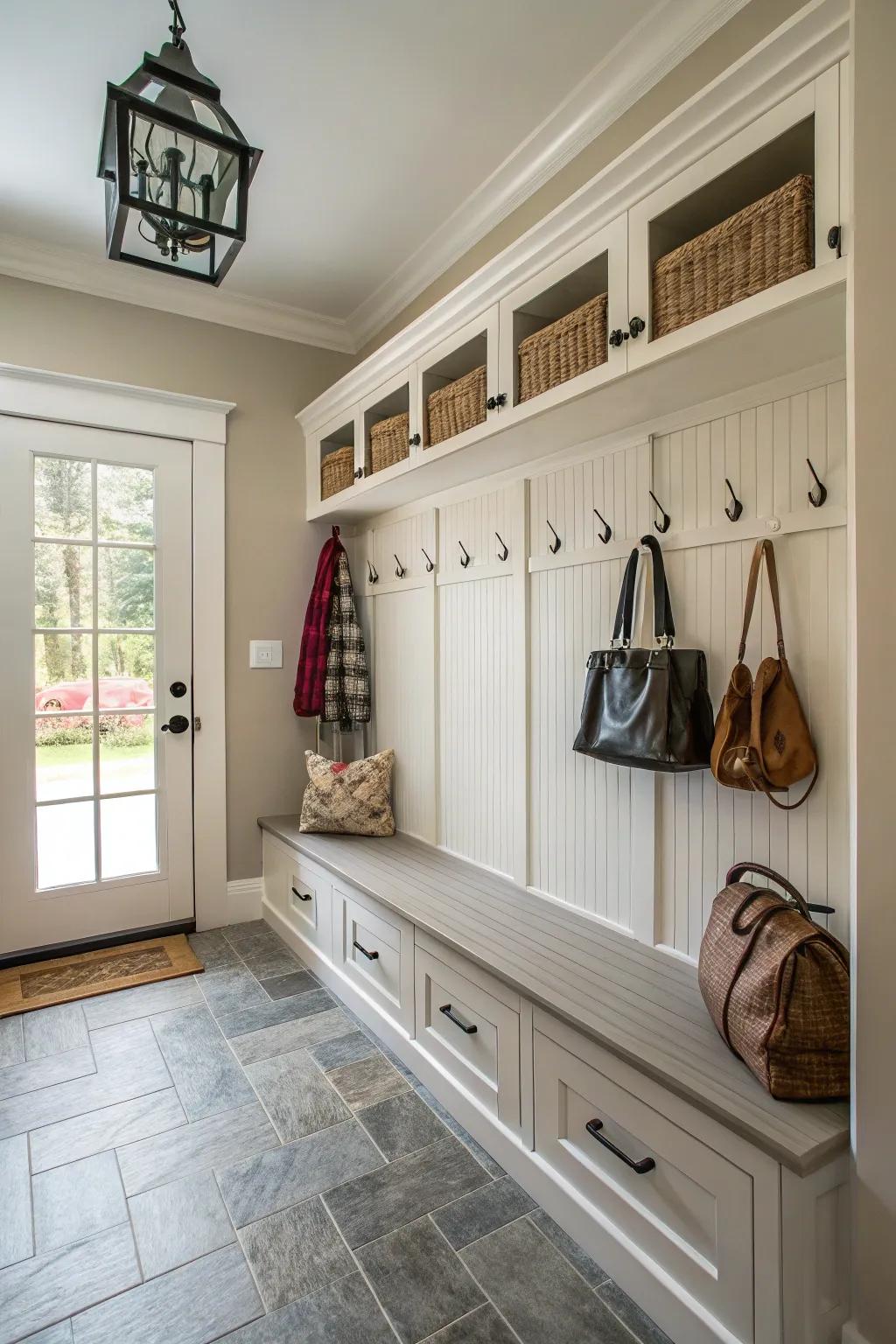 Integrating trim aesthetics injects a distinctive flair into this mudroom.