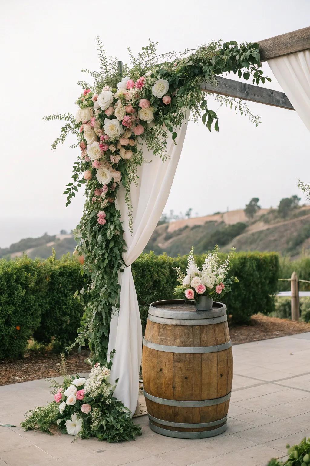 A rustic arch with wine cask bases, ideal for vineyard weddings.