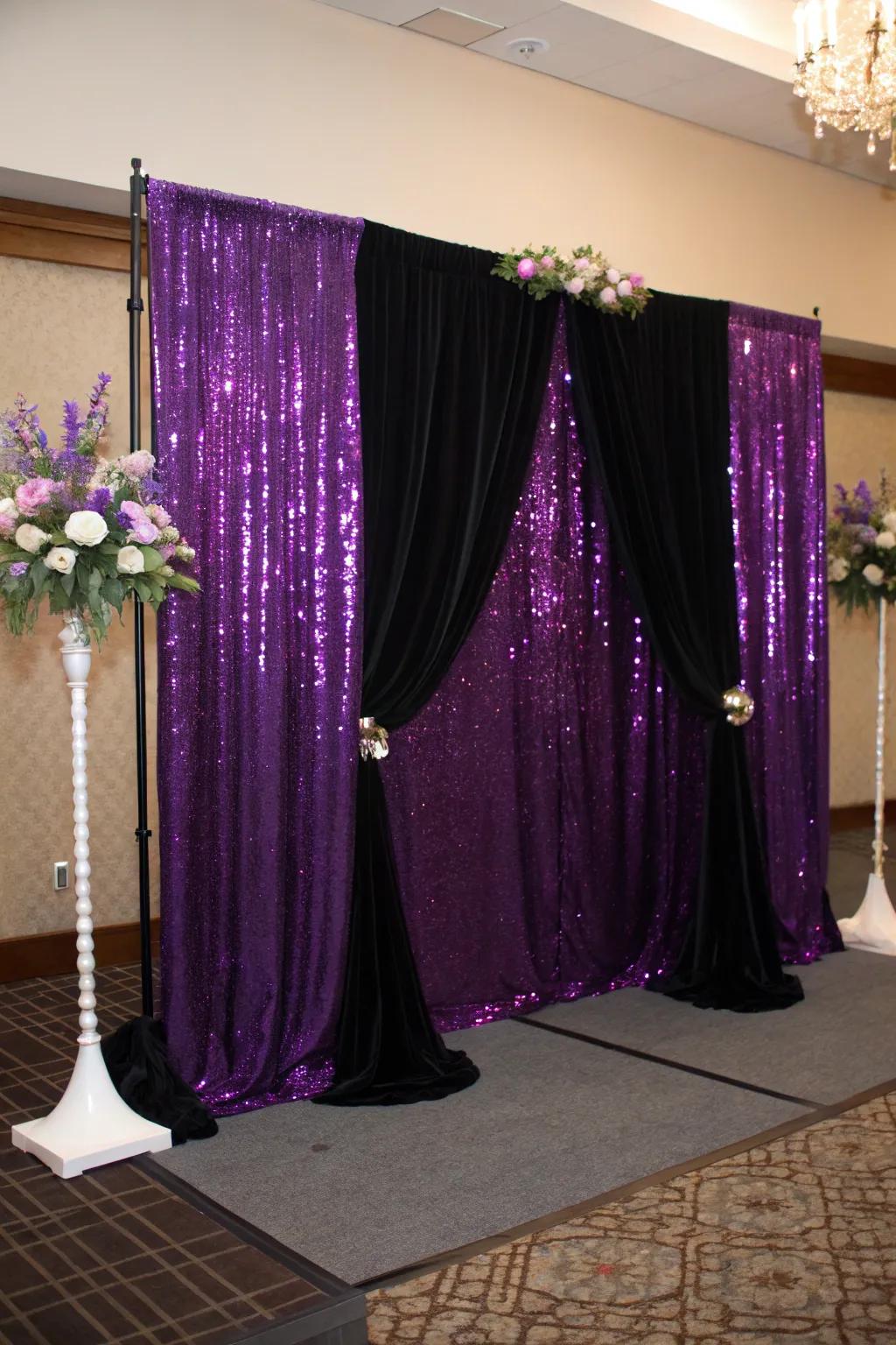 An artful reception wall art featuring violet sequins and onyx velvet.