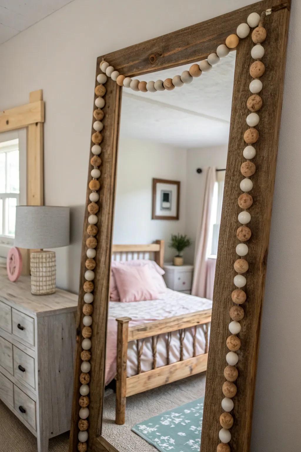 Mirror beautifully framed with timber-sphere strand.