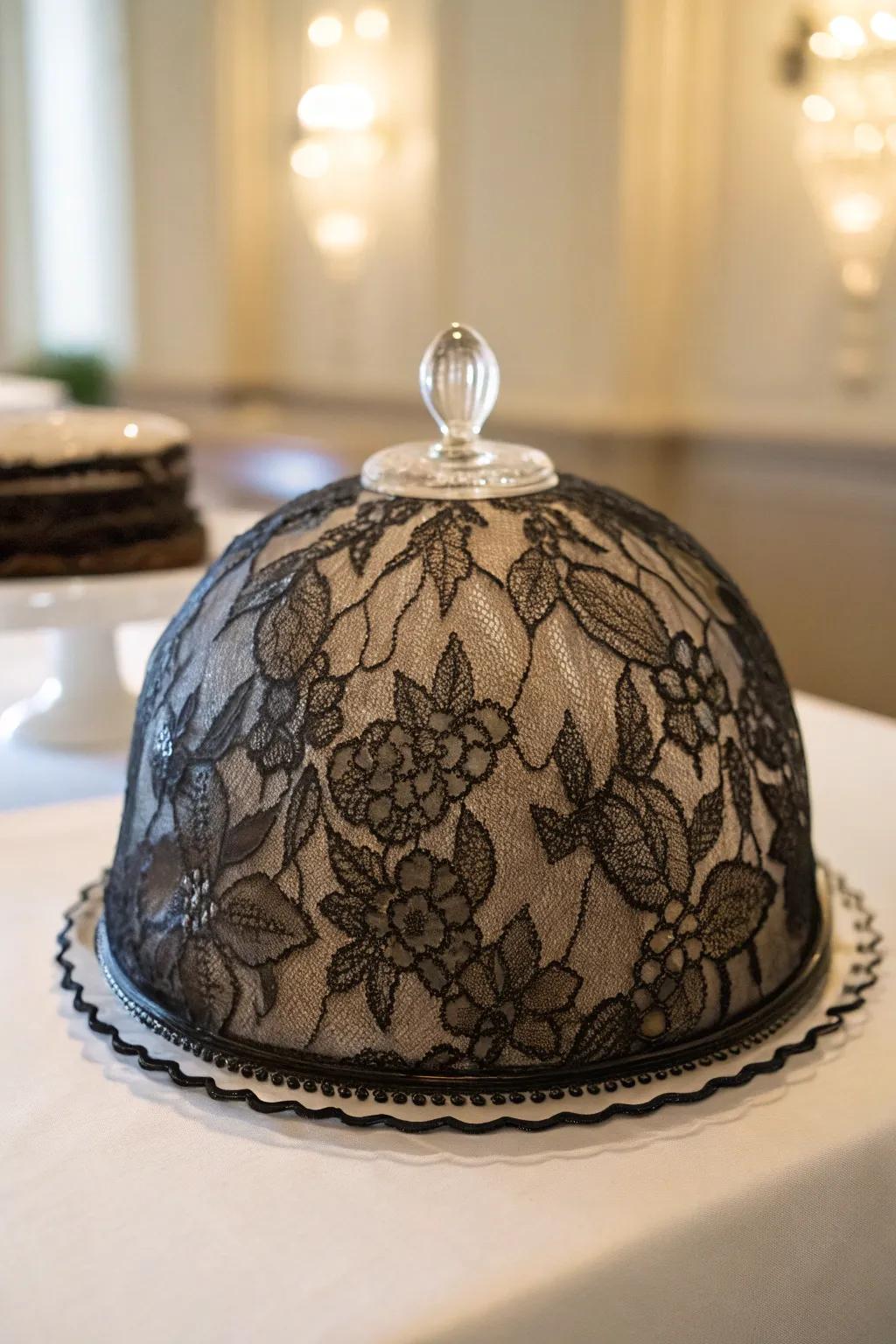 Lace material inside a display dome appends a hint of enigma.