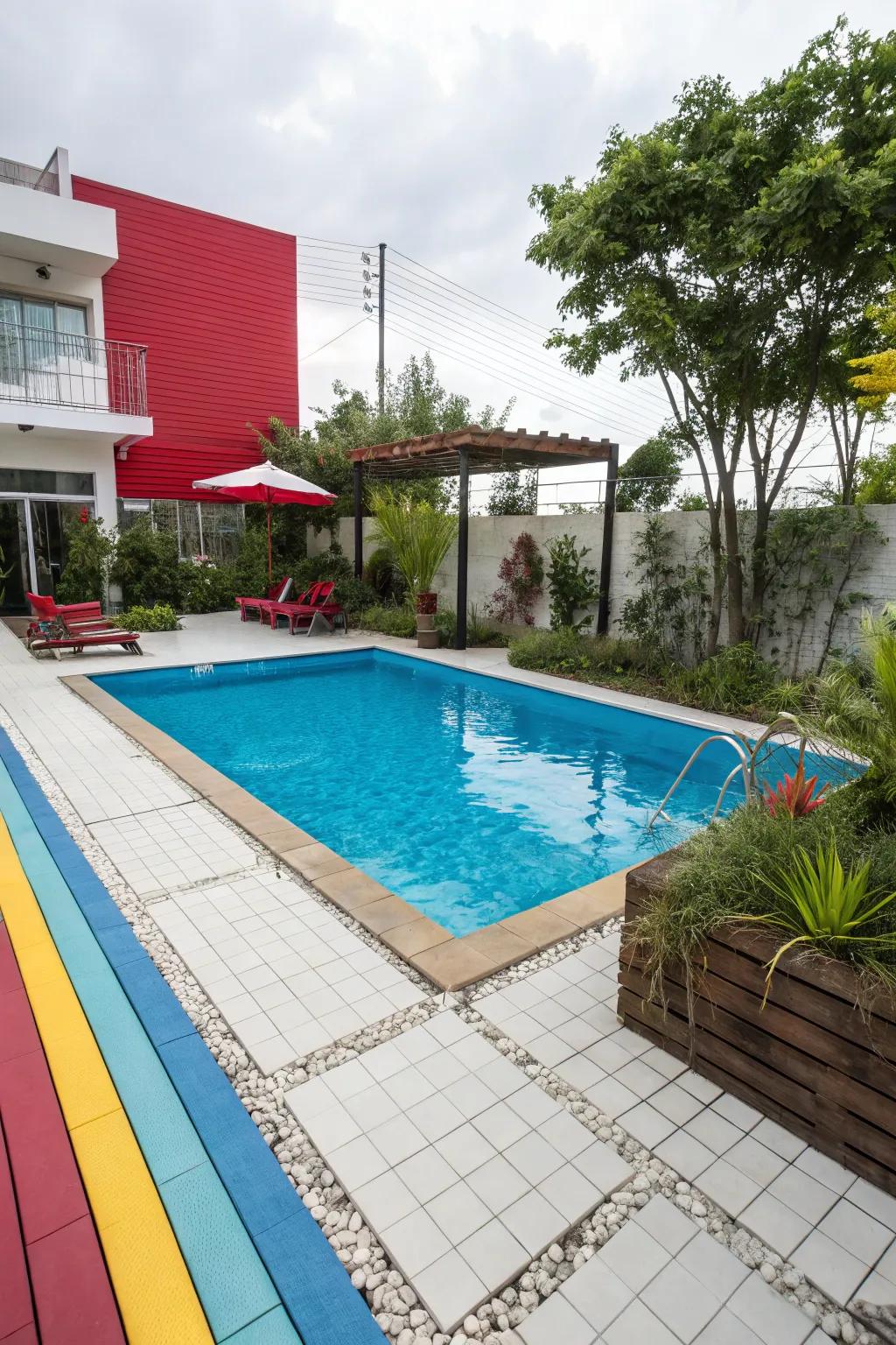 Contrasting hues create a bold and energetic poolside design.